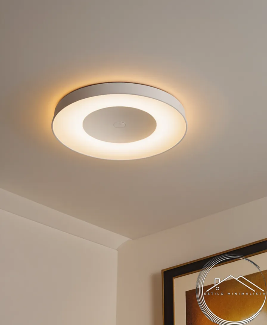 A minimalist recessed light fixture with Bluetooth controls.