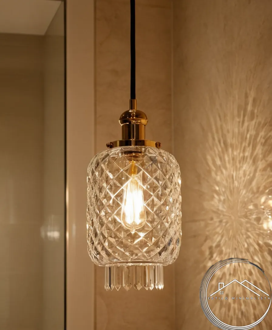 A minimalist crystal glass pendant lamp in a stylish bathroom.